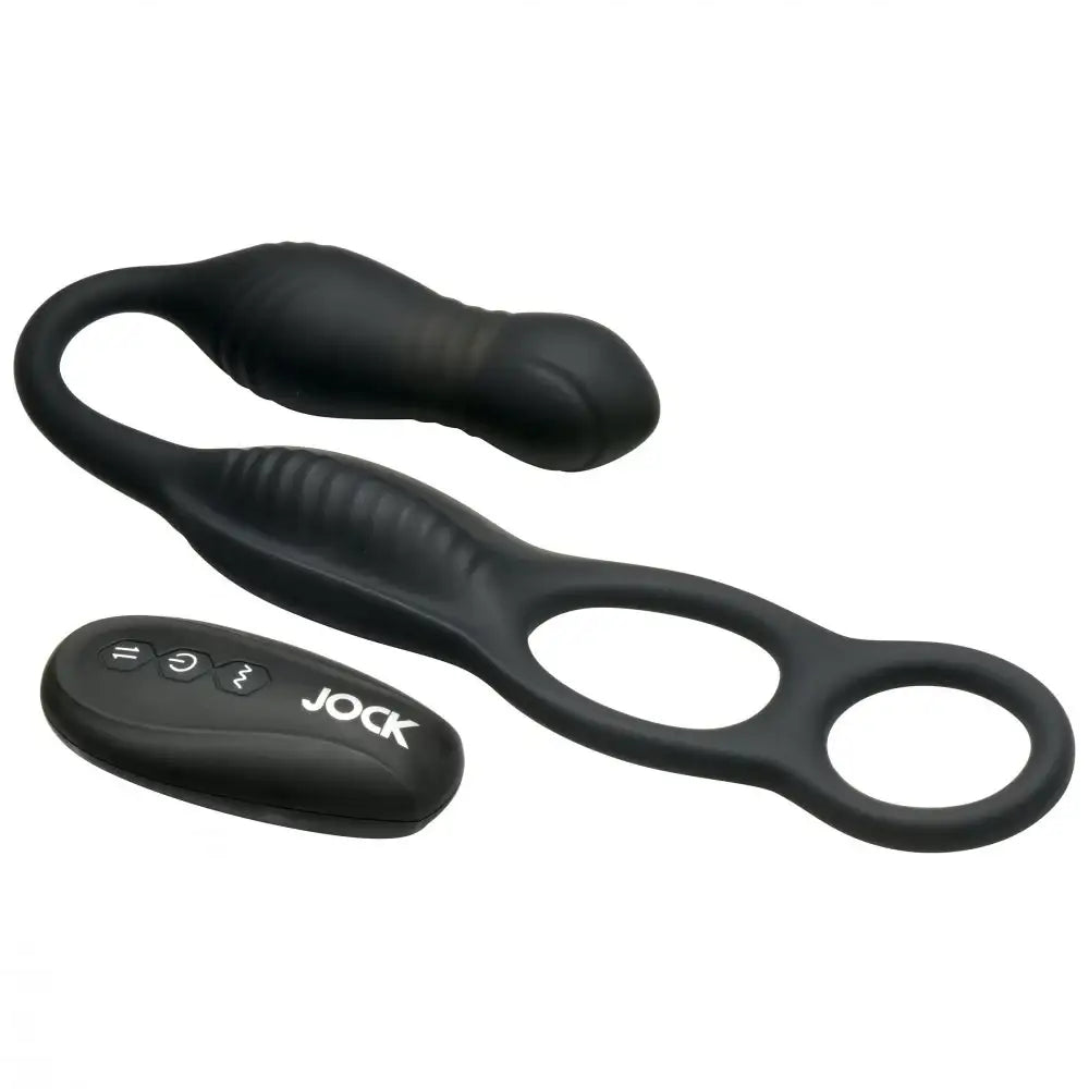 A black anal plug with a cock ring attached, featuring a ribbed texture. The product comes with a remote control for adjusting settings.