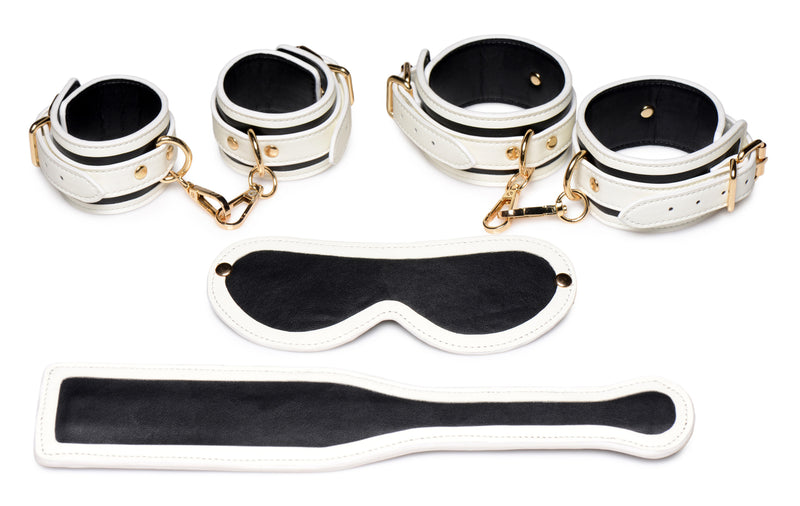 Kink in the Dark Glowing Cuffs Blindfold and Paddle Bondage Set bondage-kits from Master Series